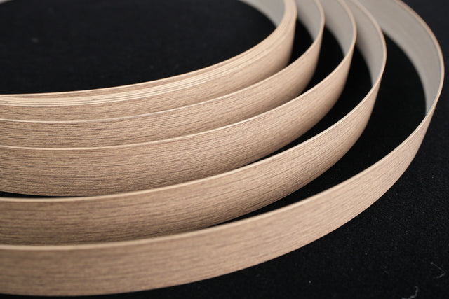 Fanned wood grain and solid color edge banding samples